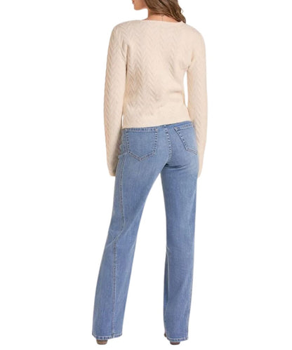 Back view of the women's long sleeve natural top featuring the ruched detailing