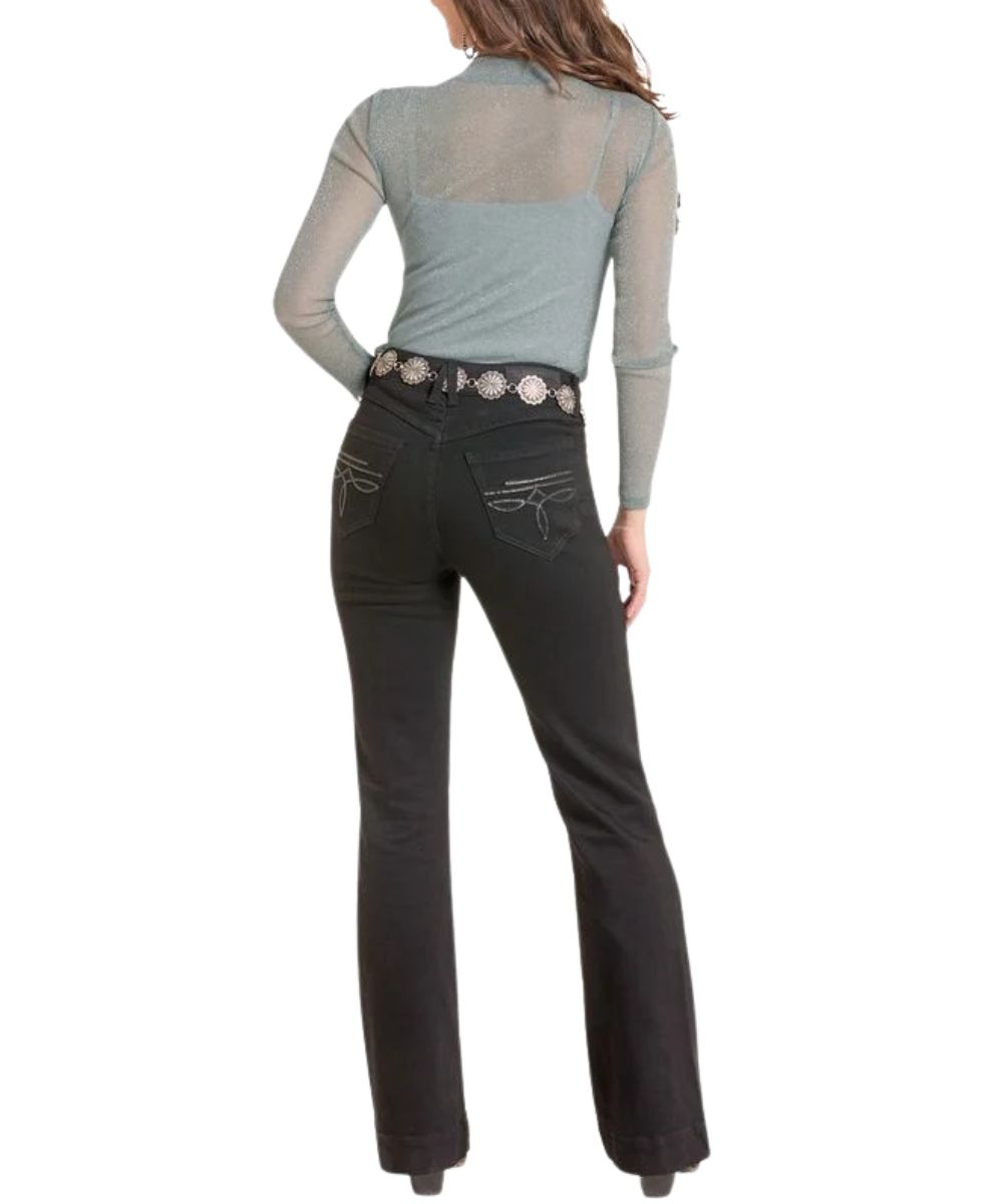 Back view of the women's jade sheer long sleeve top featuring the mock neck and metallic accents throughout
