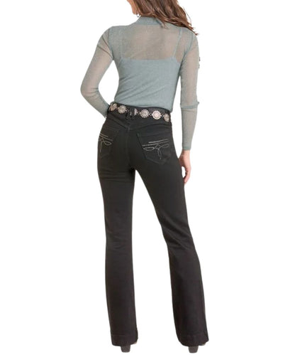 Back view of the women's jade sheer long sleeve top featuring the mock neck and metallic accents throughout