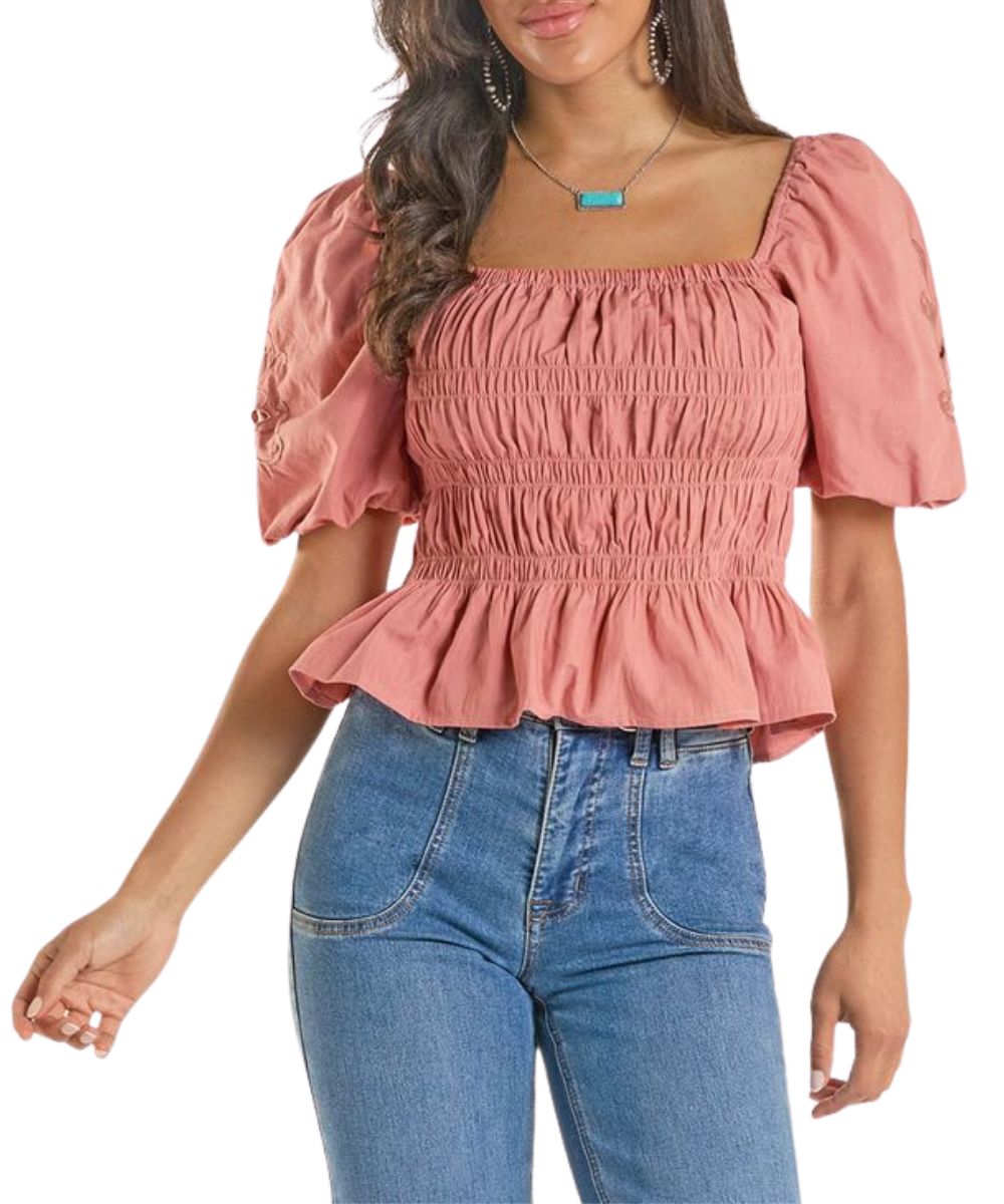 Front view of the women's rose/mauve blouse featuring a square neckline and short balloon sleeves