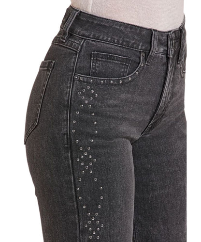 Close-up view of the women's black wide leg jean featuring the studded accents along the front pocket and side seam