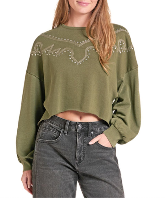 Front view of the women's Rock & Roll Cowgirl long sleeve olive cropped sweatshirt with western-style embroidery and stud detailing across the chest