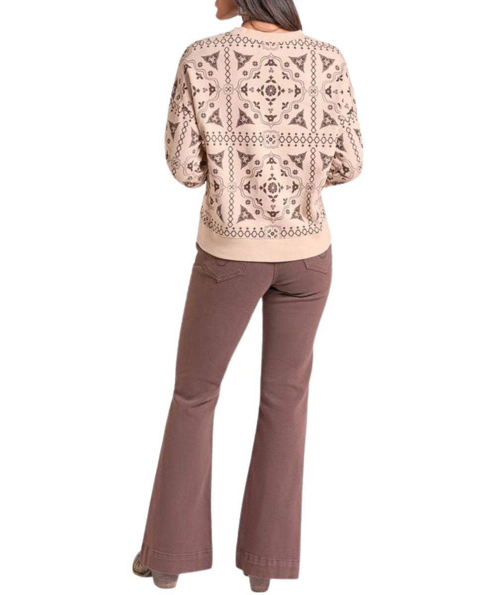 Back view of the women's tan bandana print sweater featuring dropped shoulders