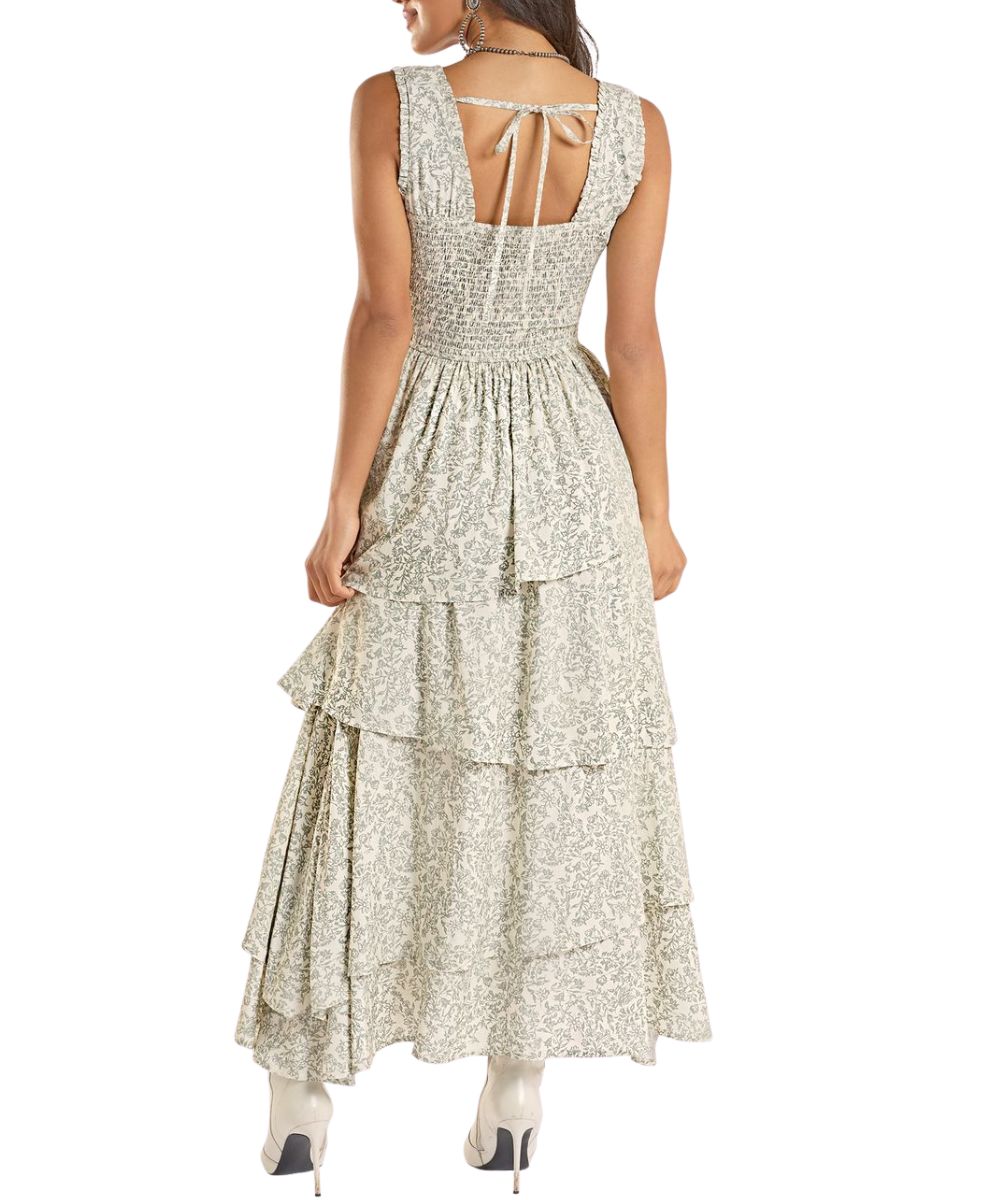 Back view of the women's jade floral dress featuring a smocked back and tie closure
