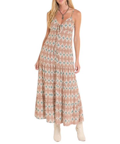 Front view of the women's rust ikat print midi dress featuring a button-front closure, a v-neckline with self-tie closure, and a tiered skirt
