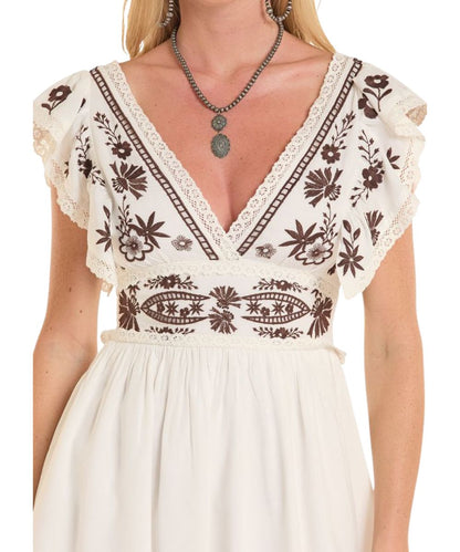 Close-up view of the v-neckline and front embroidery details