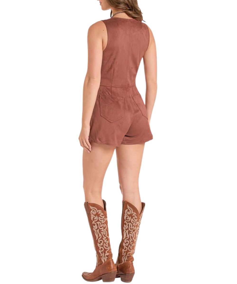 Back view of the women's brass microsuede sleeveless romper featuring the back patch pockets on the shorts