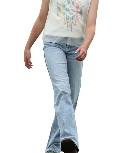 Front view of a girl modeling the indigo acid washed wide leg jeans