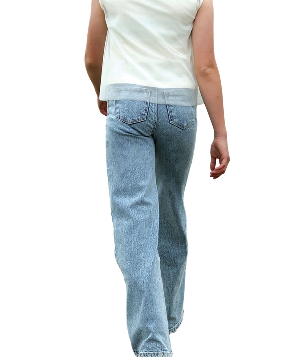 Back view of a girl modeling the acid washed wide leg jeans