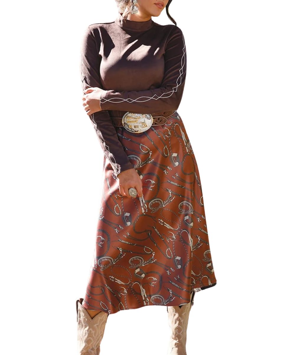 Front view of the women's burgundy Cruel Girl satin skirt featuring the western tack-inspired print and midi length