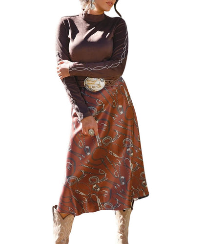 Front view of the women's burgundy Cruel Girl satin skirt featuring the western tack-inspired print and midi length