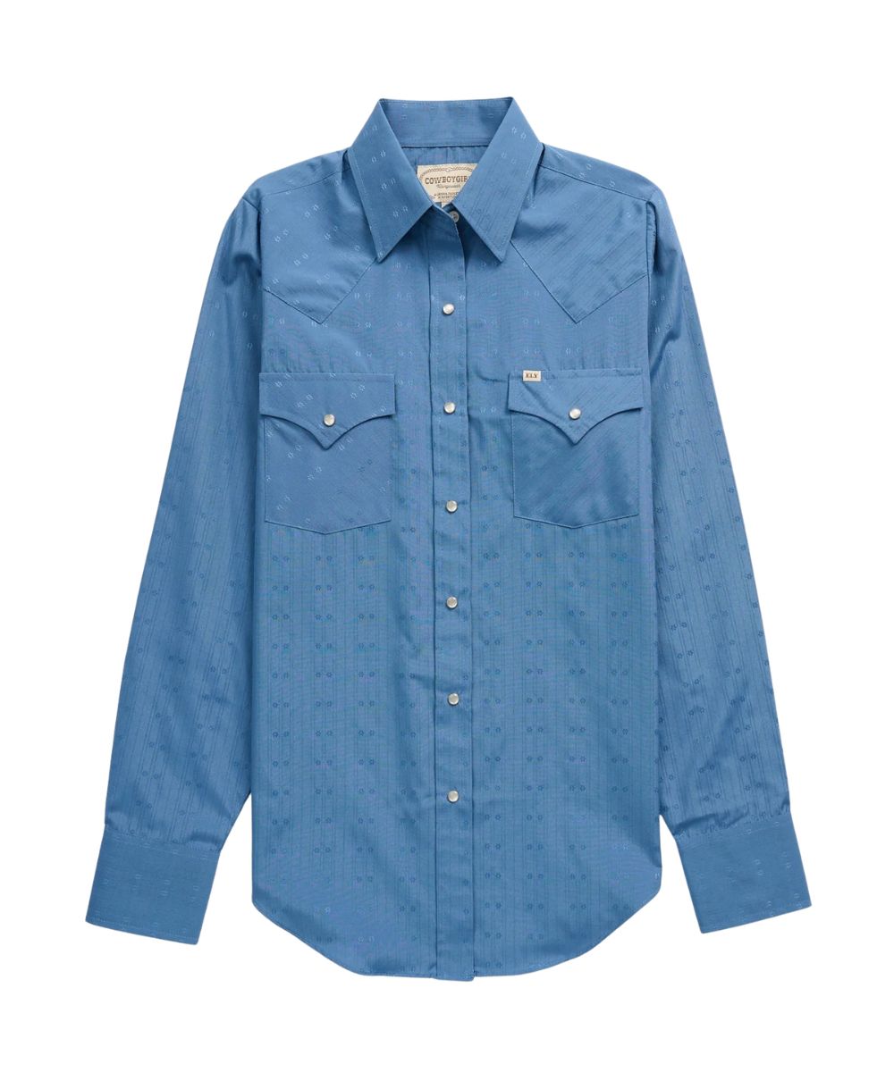 Front view of the women's Cowboy Blue Tonal Dobby Solid Ely Cattleman long sleeve snap shirt featuring the pearl snaps, chest pockets, western yokes, and a spread collar