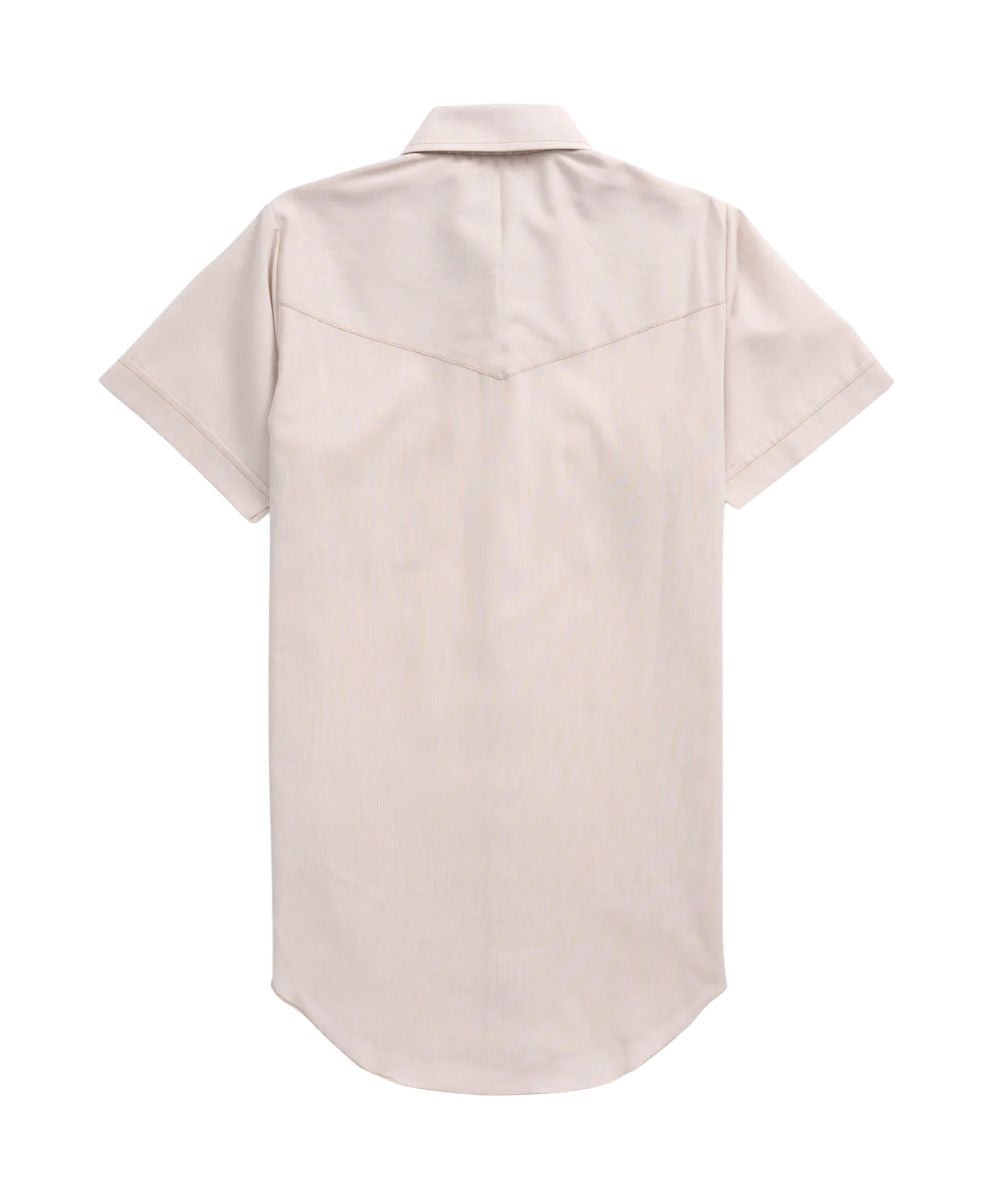 Back view of the women's dust chambray short sleeve snap shirt featuring a single point yoke