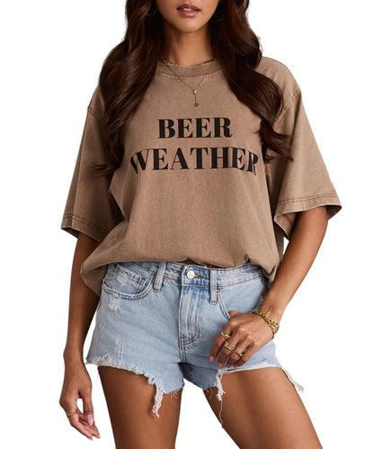 Front view of the women's washed brown Panache graphic tee featuring the relaxed fit and text across the chest that reads: "Beer Weather"