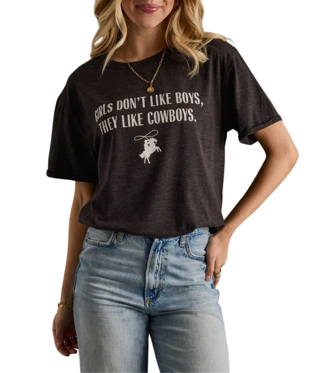 Front view of the women's heather black Panache Apparel graphic tee featuring an oversized fit and front white screen print that reads: "Girls Don't Like Boys, They Like Cowboys."