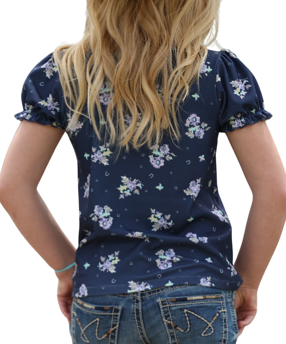 Back view of the girl's short sleeve navy floral print top