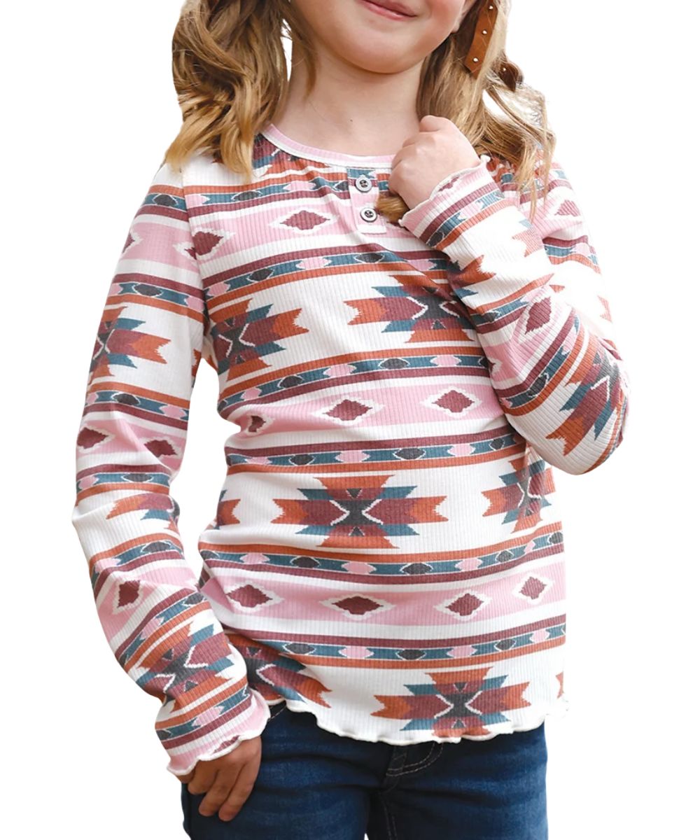 Front view of the girl's white and pink Cruel Girl long sleeve henley top featuring the crew neck, faux metal pewter buttons, and the multicolor aztec print