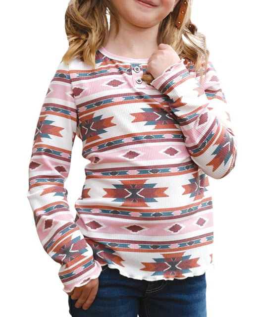 Front view of the girl's white and pink Cruel Girl long sleeve henley top featuring the crew neck, faux metal pewter buttons, and the multicolor aztec print