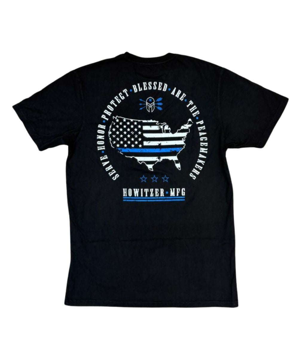 Back view of the men's black graphic tee featuring a United States graphic with the thin blue line and text that reads: "Serve, honor, protect, blessed are the peacemakers"