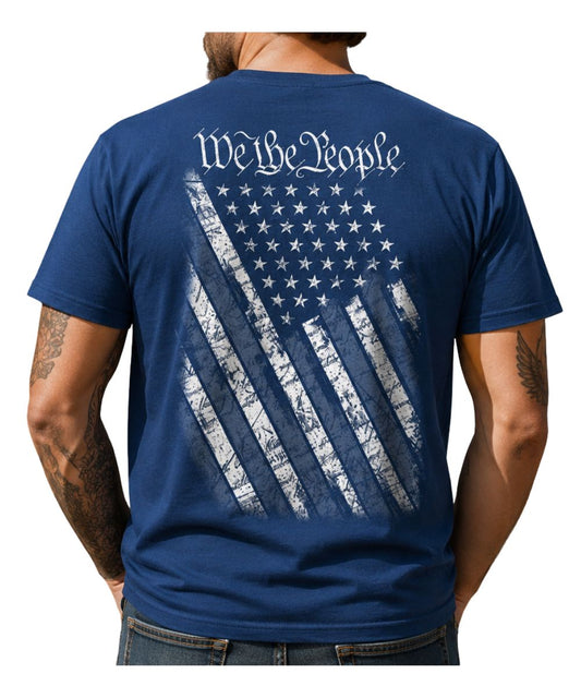 Back view of a man modeling the electric blue tee with an American Flag graphic that reads: "We The People"