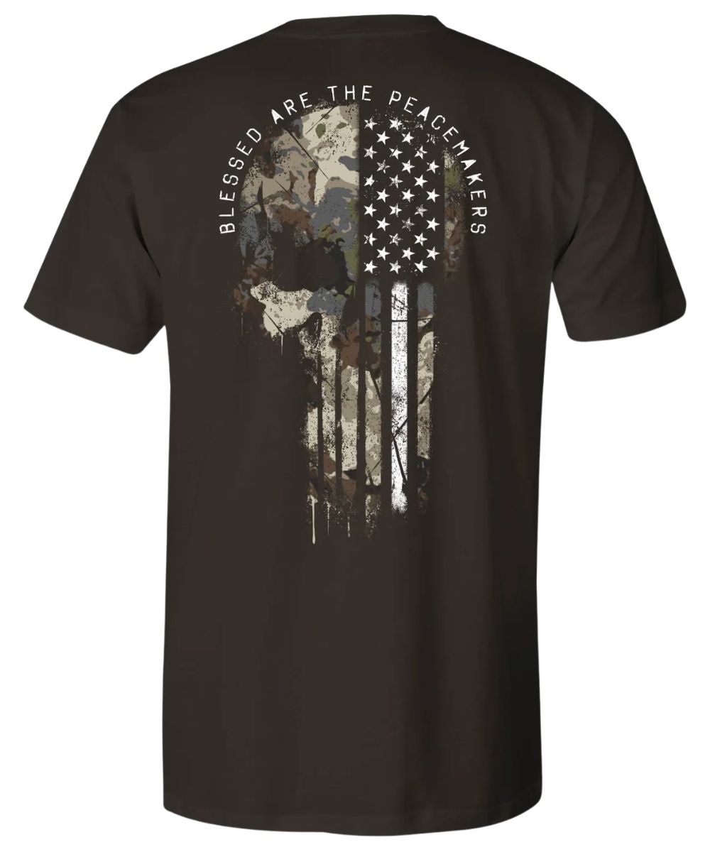 Back view of the men's java black Howitzer graphic tee featuring the camo American Flag skull graphic that reads: "Blessed Are The Peacemakers"