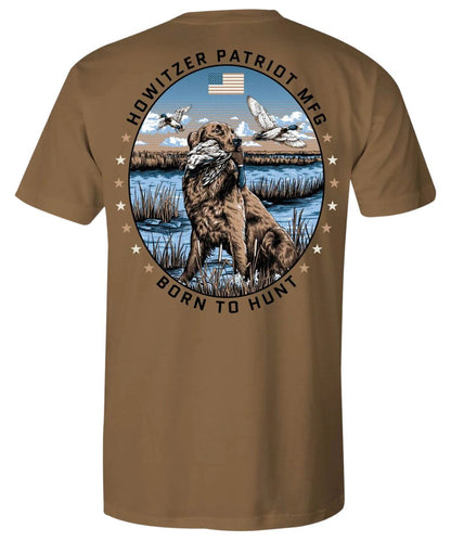 Back view of the men's brown sugar Howitzer graphic tee featuring the short sleeves and a retrieving dog graphic on the back with text that reads: "Born To Hunt"