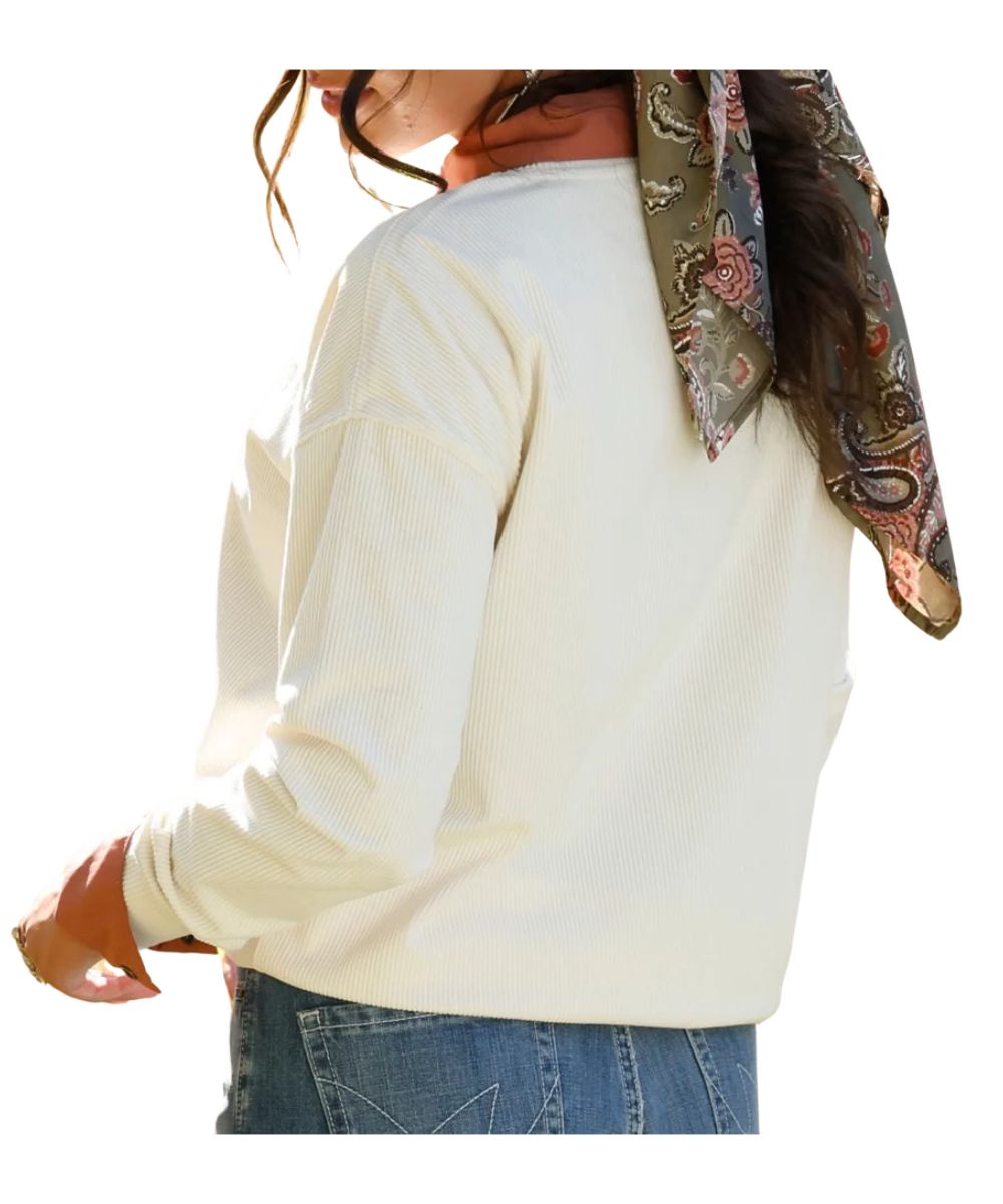 Back view of the women's cream corduroy sweatshirt featuring the long sleeves, crew neck, and dropped shoulders