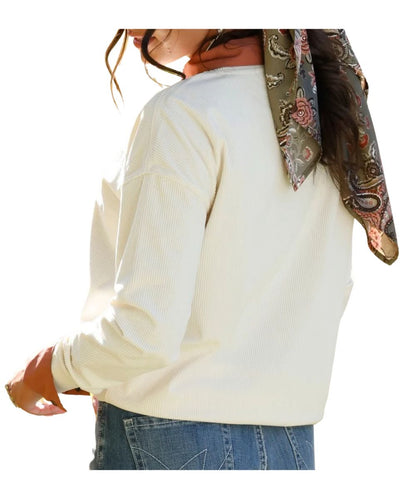 Back view of the women's cream corduroy sweatshirt featuring the long sleeves, crew neck, and dropped shoulders