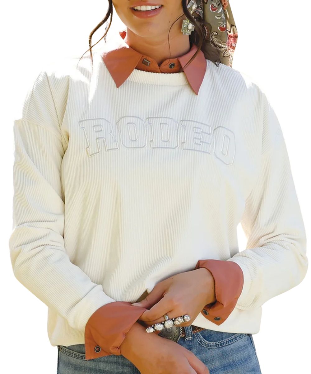 Front view of the women's cream Cruel Girl Rodeo Sweatshirt featuring the corduroy fabric and embroidery on the chest that reads: "Rodeo"