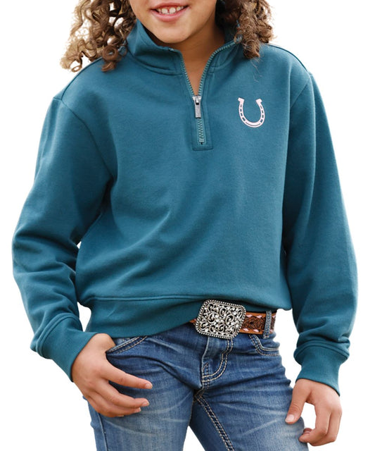Front view of the girl's teal Cruel Girl long sleeve pullover featuring the mock collar, 1/4 zip closure, dropped shoulders, rib knit trim, and a white horseshoe embroidered at the left chest