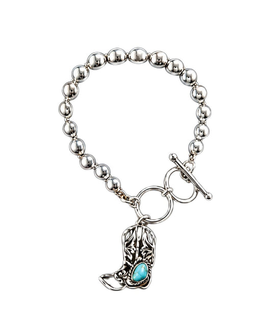 Women's Silver Beaded Bracelet Featuring A Boot Pendant With A Turquoise Stone