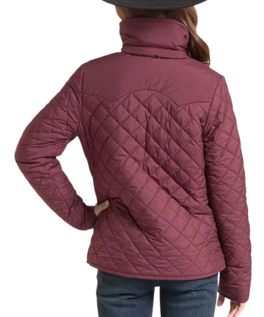 Back view of the girl's wine puffer jacket featuring the mock collar and double pointed back yoke