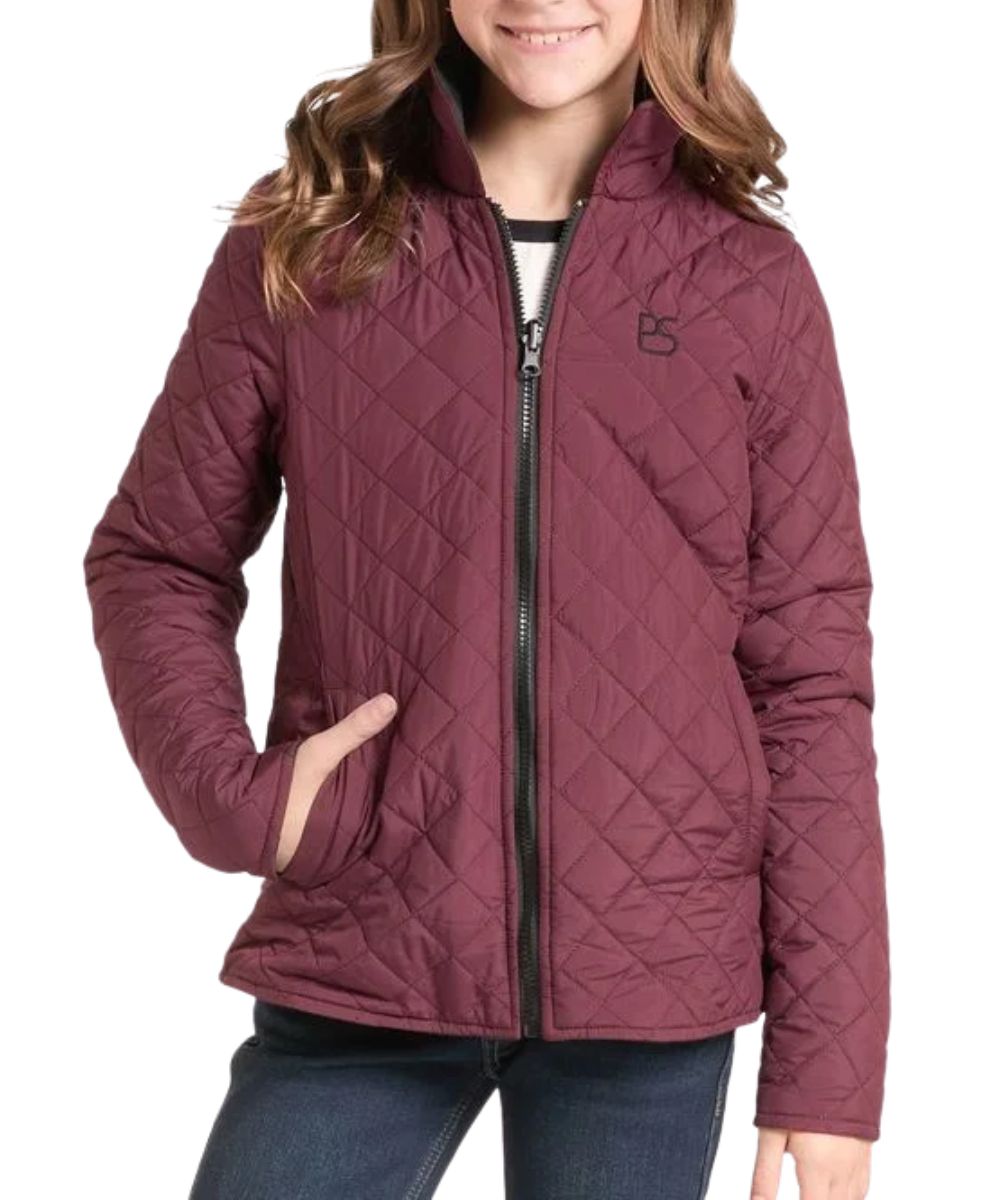Front view of the girl's wine quilted reversible puffer jacket by Panhandle Slim featuring the zip-up closure, mock collar, and hand pockets