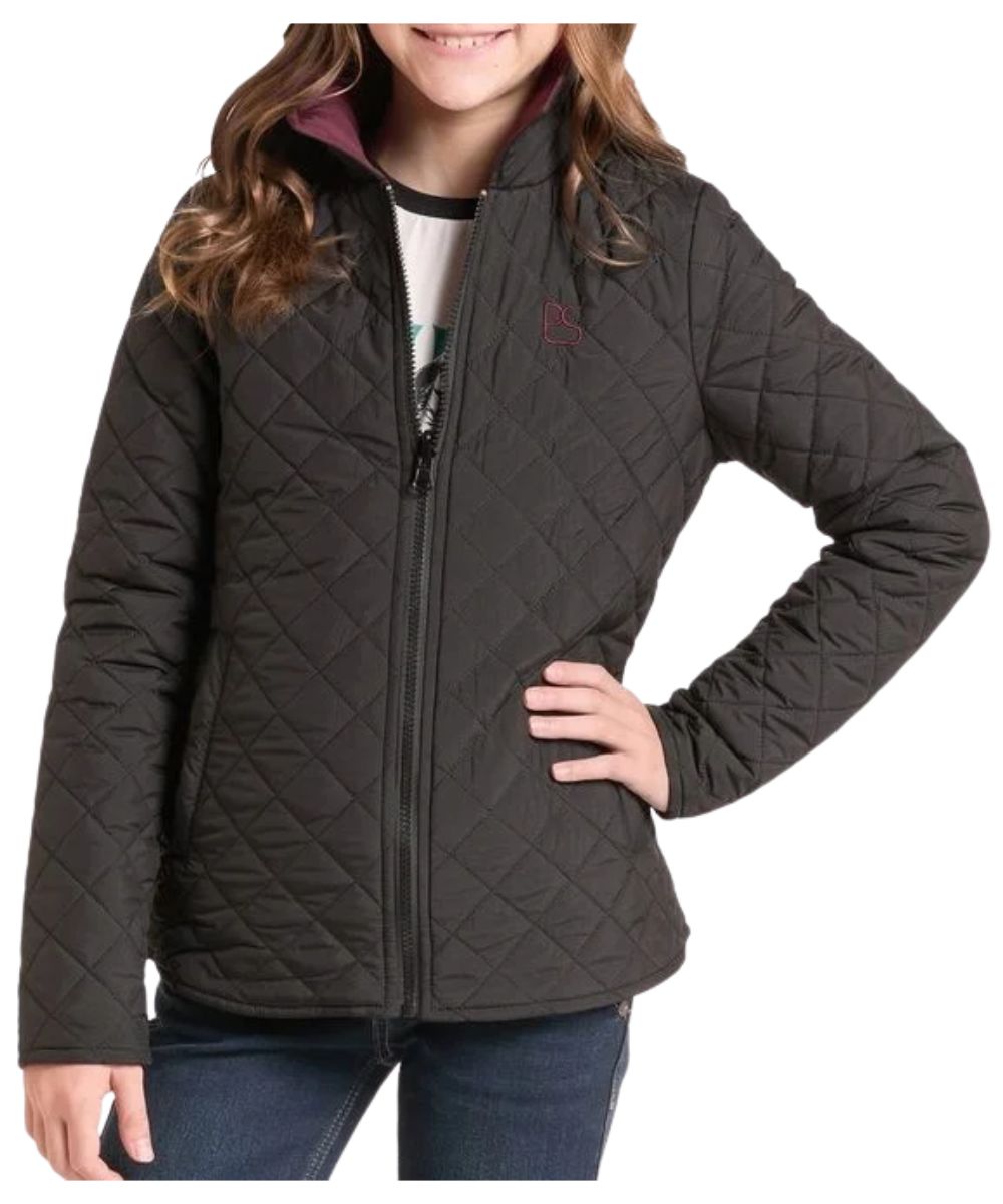 Front view of the girl's black jacket reversed from the wine quilted jacket