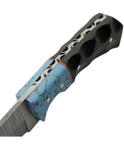 Side view of the turquoise resin and black micarta handle