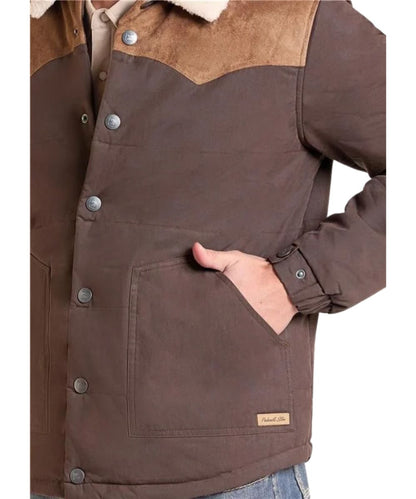 Close-up view of the nylon cotton puffer fabric, and the hand pocket with logo label