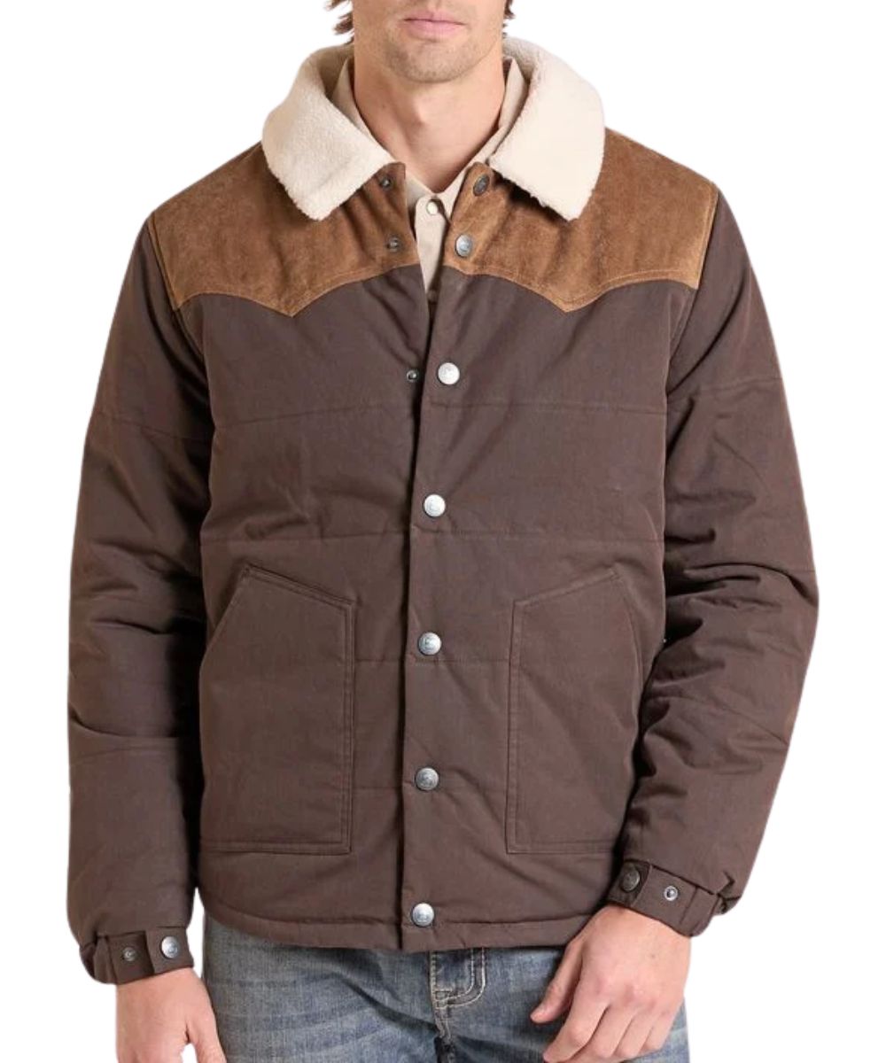 Front view of the men's chocolate Panhandle Puffer Coat featuring the spread collar with berber lining, snap closure, adjustable snap cuffs, color blocked suede yokes, and hand pockets