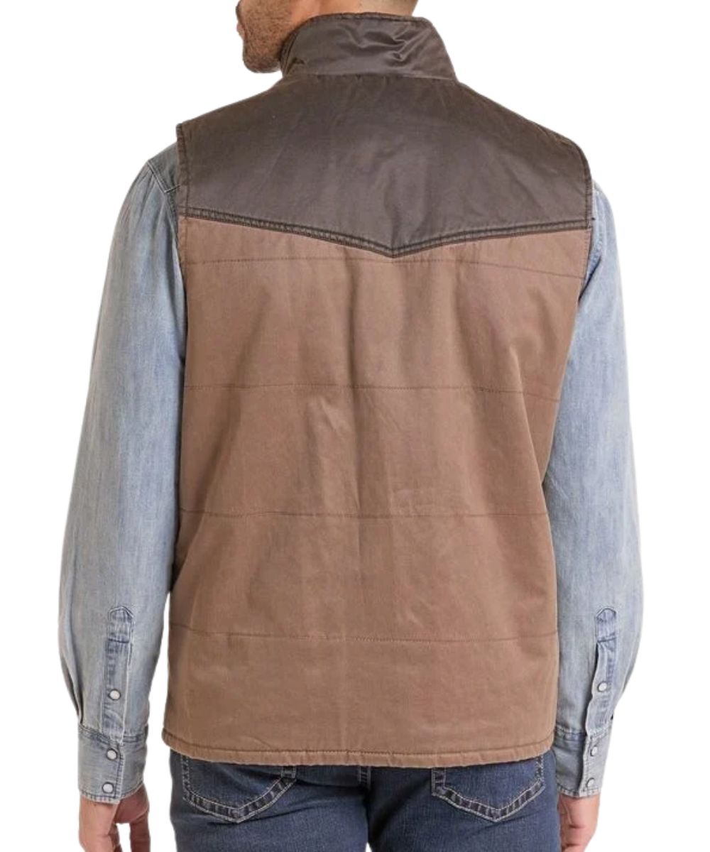 Back view of the men's chocolate brown waxed canvas vest featuring the color blocked single point back yoke and mock collar