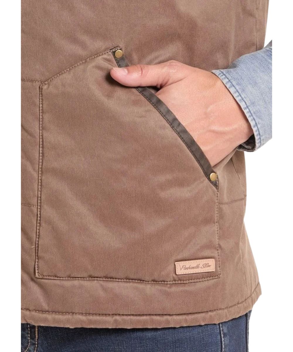 Close-up view of the front hand pocket featuring the logo label 