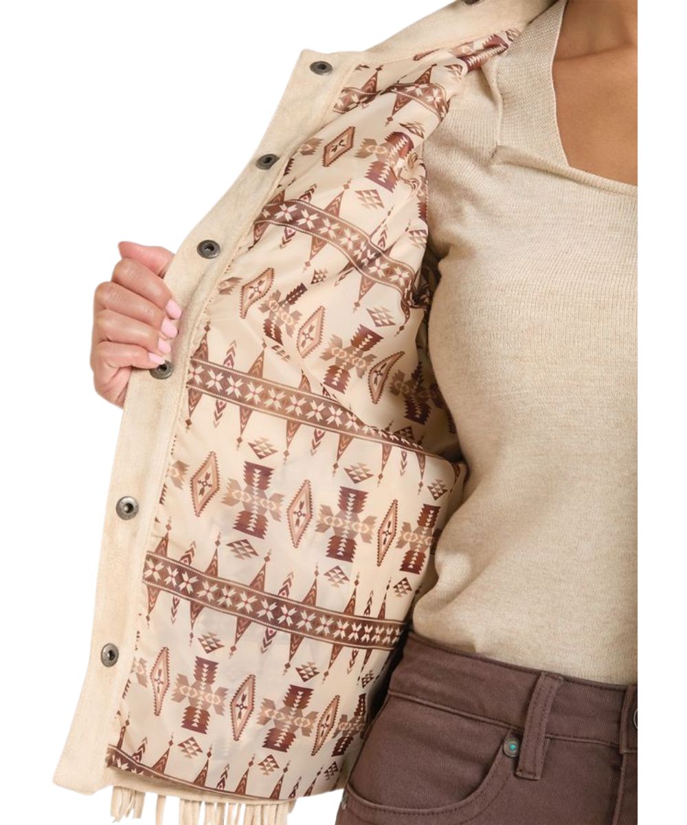 Close-up view of the contrast patterned interior lining on the women's natural jacket