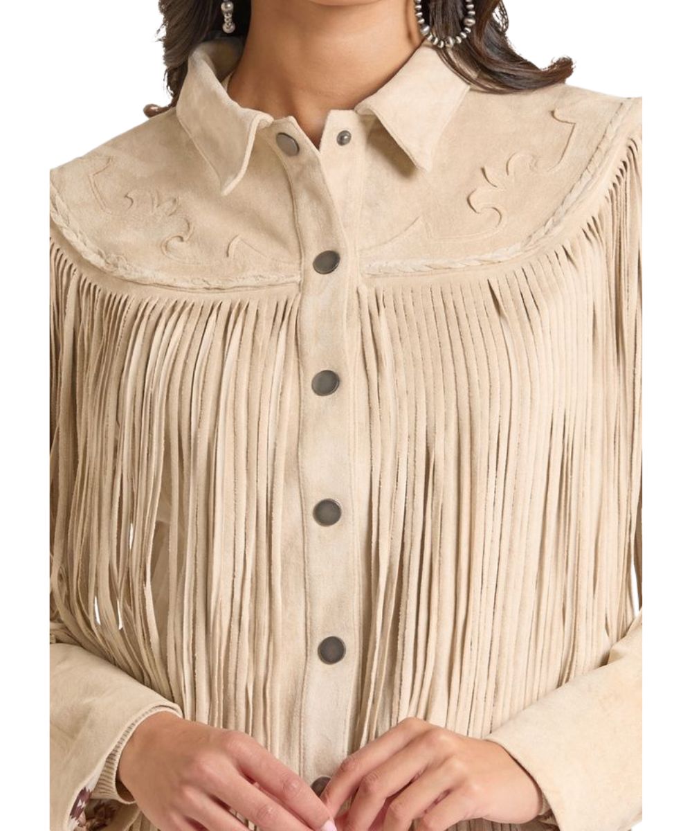 Close-up view of the women's suede fringe jacket in natural featuring the western embroidered yokes and bold fringe