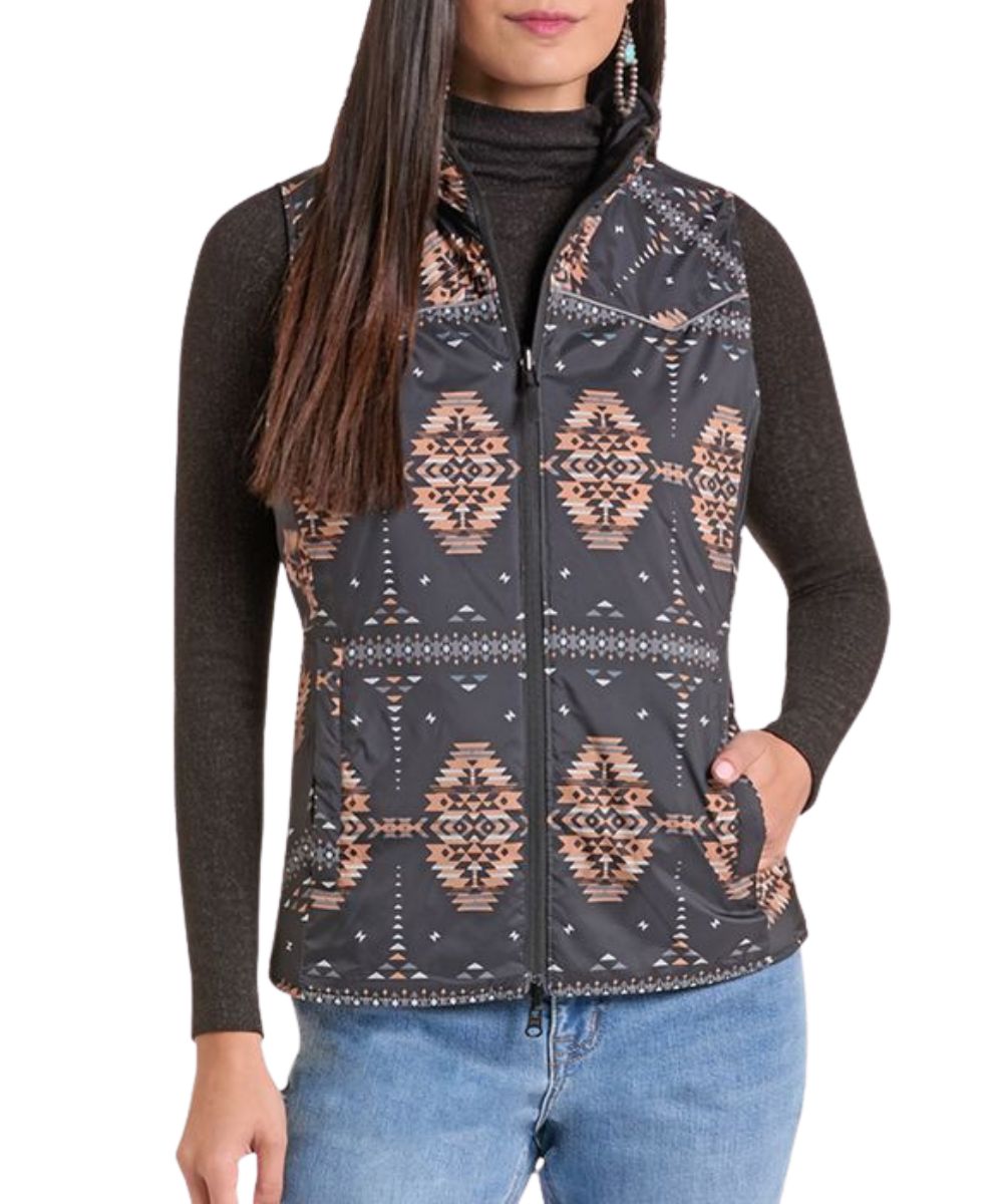 Front view of the women's Panhandle Black & Aztec Reversible Vest featuring the two-way zipper closure, western yokes, hand pockets, and water resistance. Reverse side displays the black aztec side.