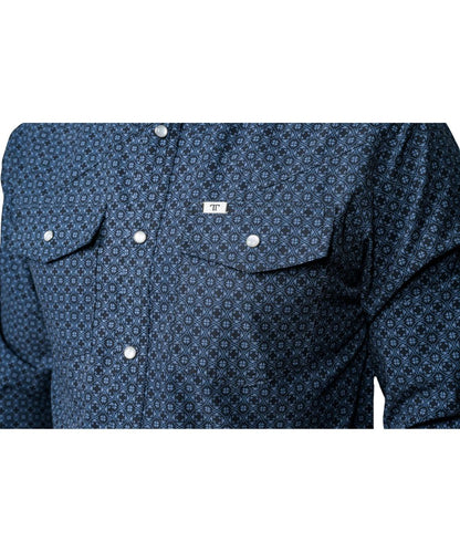 Close-up of men's black pearl snap shirt with blue geometric print showing chest pockets, pen slot, and hidden snap collar