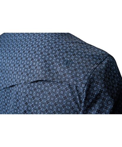 Close-up of the back shoulder showing the vented back yoke on a men's black pearl snap shirt with blue geometric print