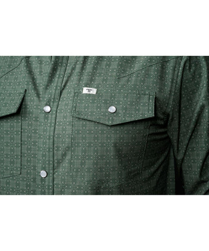 Close-up view of the geometric print and chest pockets