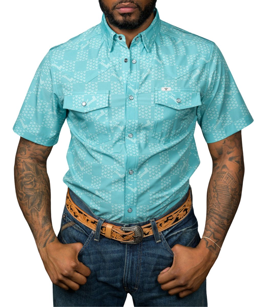 Front view of the men's short sleeve green pearl snap shirt featuring a geometric logo check print
