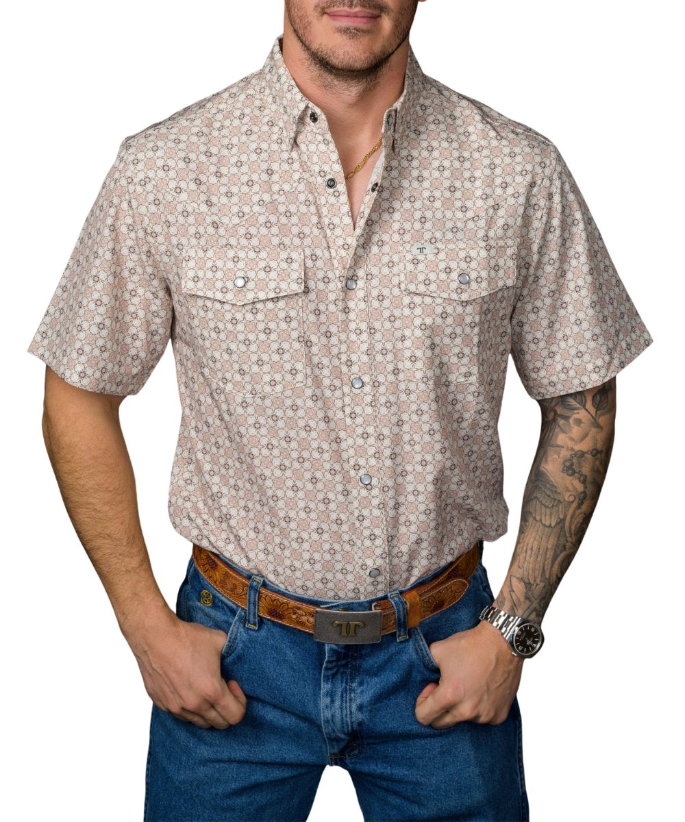 Front view of the men's Ferrell Brand cream geometric floral print short sleeve pearl snap shirt featuring the chest pockets, western yokes, and lightweight breathable fabric