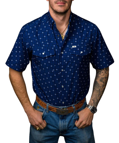 Front view of the men's royal blue Ferrell Brand short sleeve snap shirt featuring the hidden snap down collar, pearl snaps, chest pockets, and geometric print