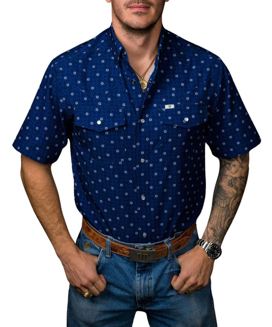 Front view of the men's royal blue Ferrell Brand short sleeve snap shirt featuring the hidden snap down collar, pearl snaps, chest pockets, and geometric print