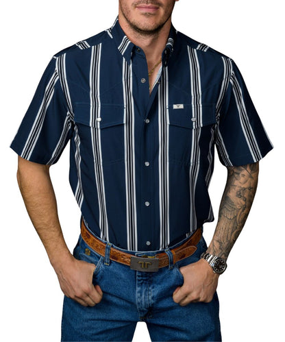 Front view of the men's navy blue Ferrell Brand short sleeve snap shirt featuring the bold white vertical striped print, pearl snaps, hidden snap down collar, and wrinkle resistance